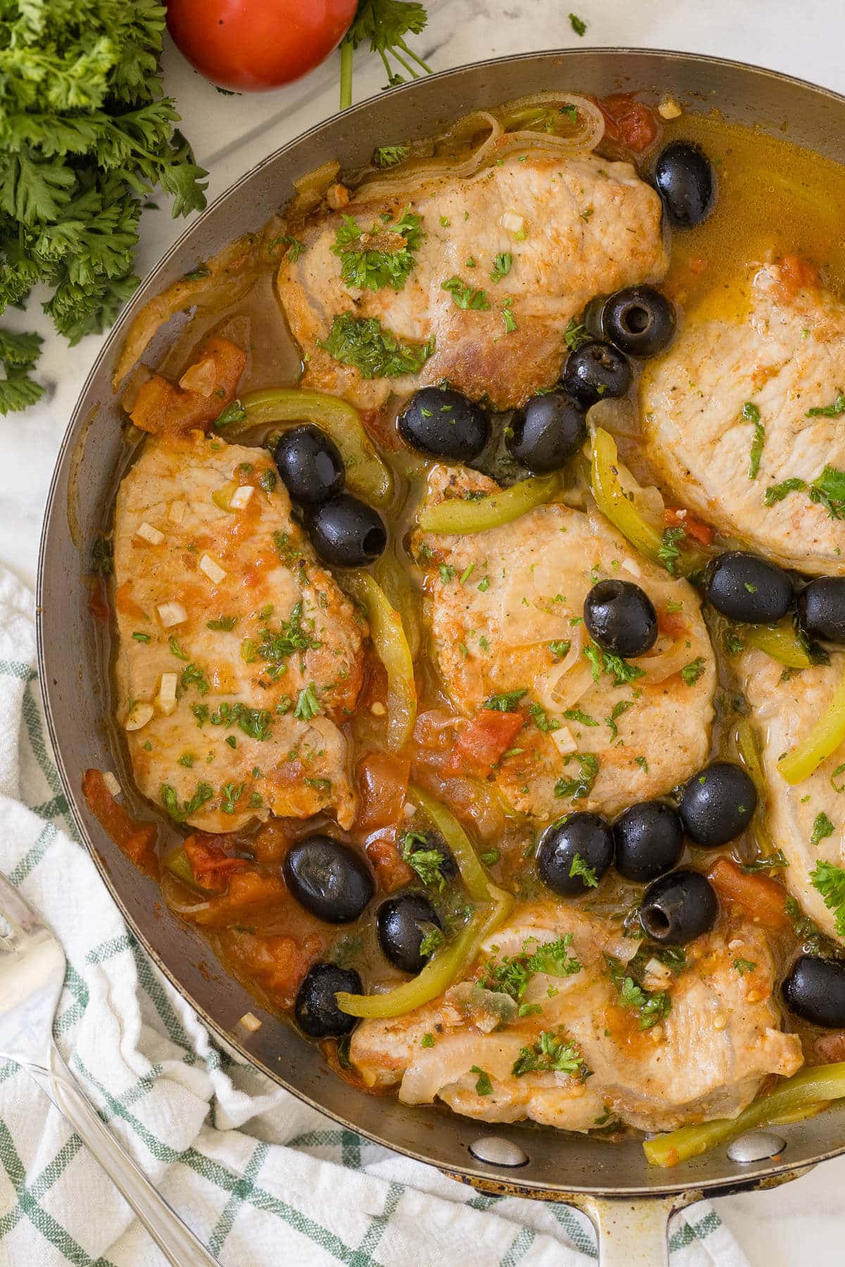 Savory pork chops in a pan.