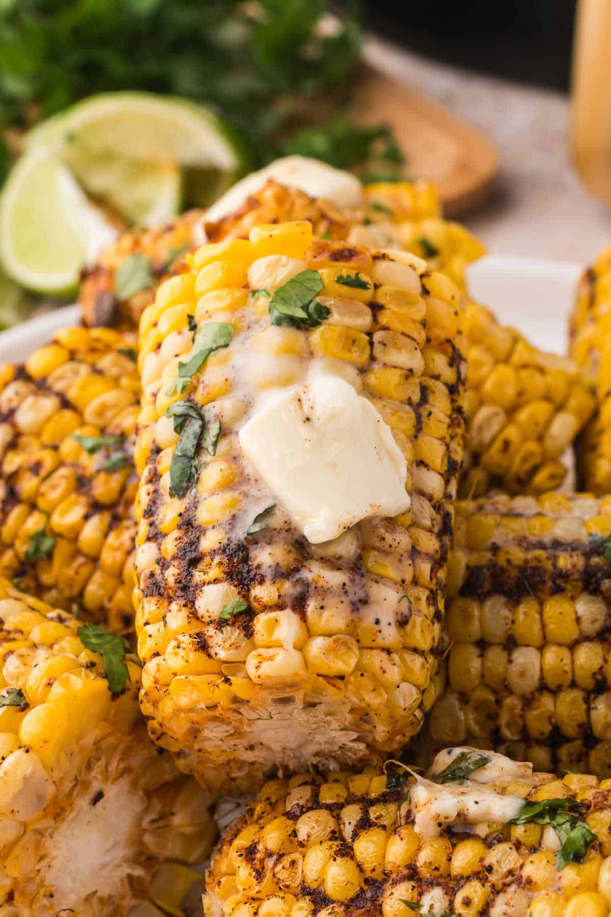 Corn on the cob topped with butter.