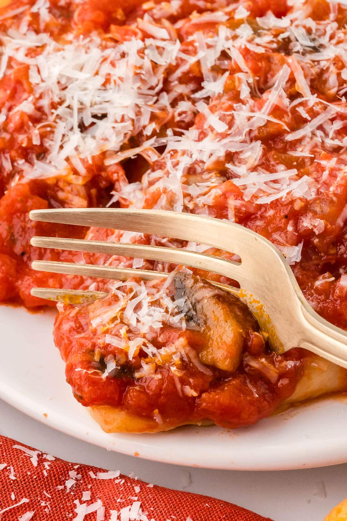 The recipe on a plate with a fork.