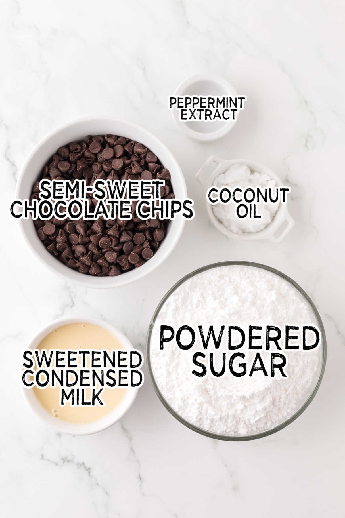 Ingredients on a white marble counter.