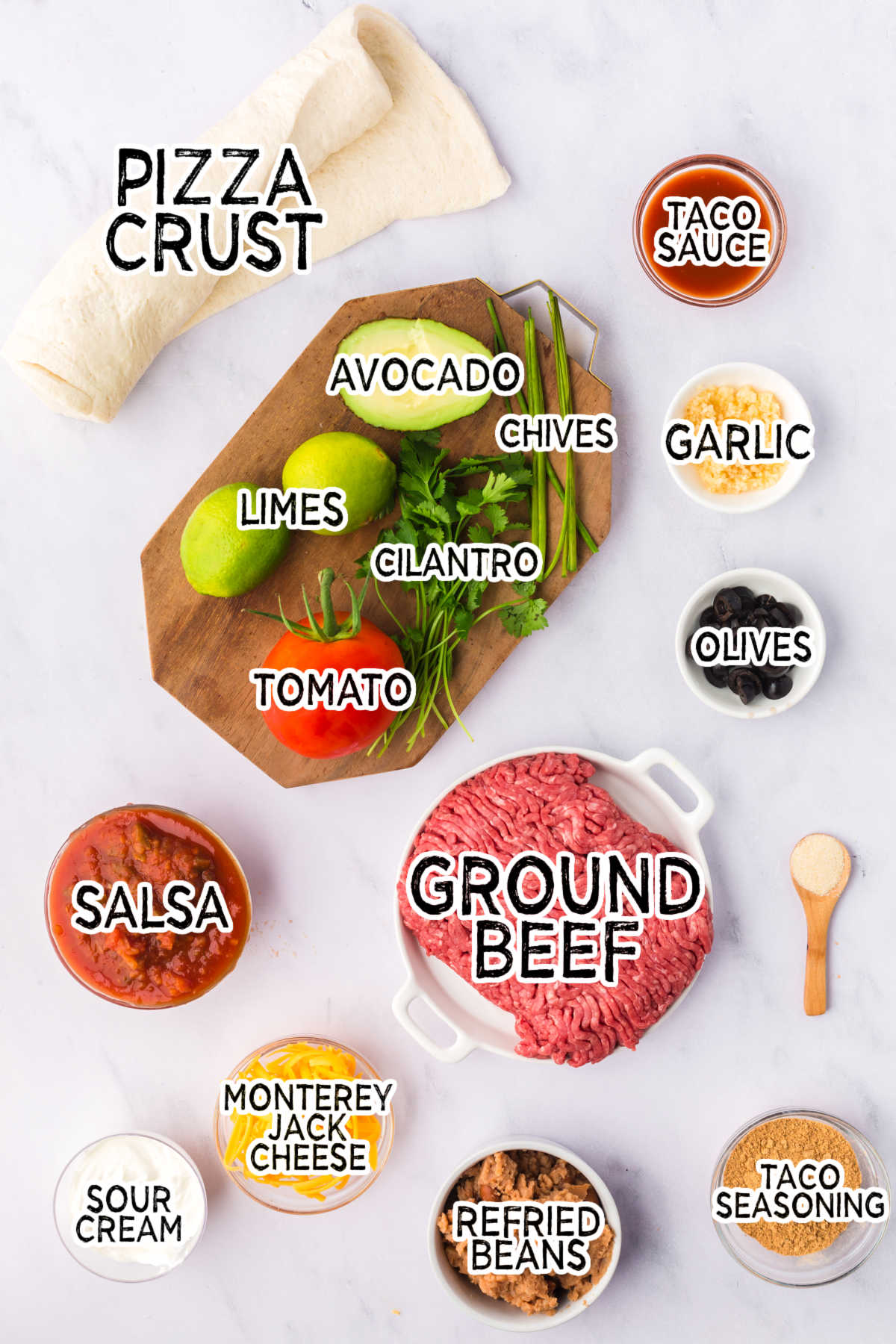 Ingredients on a white counter.