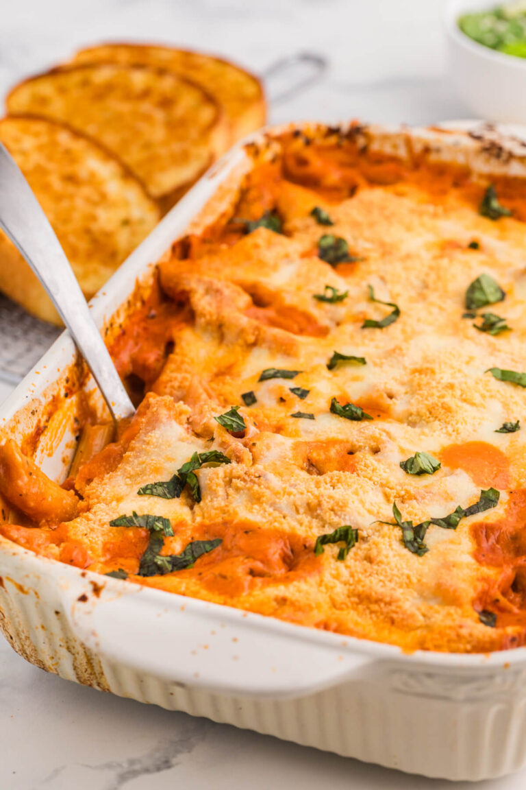 The recipe in a pan with a serving spoon in it.