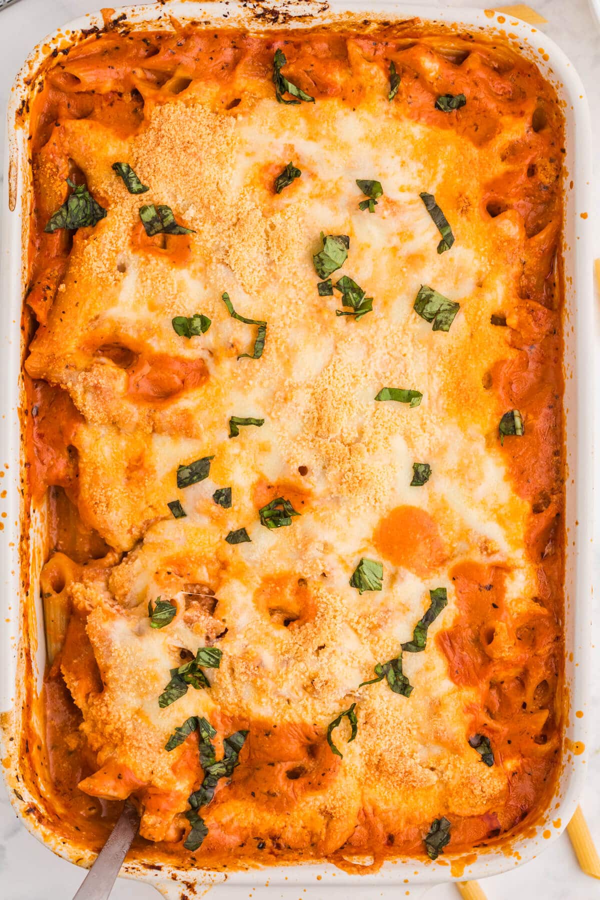 No-Boil Baked Penne in a white casserole dish.