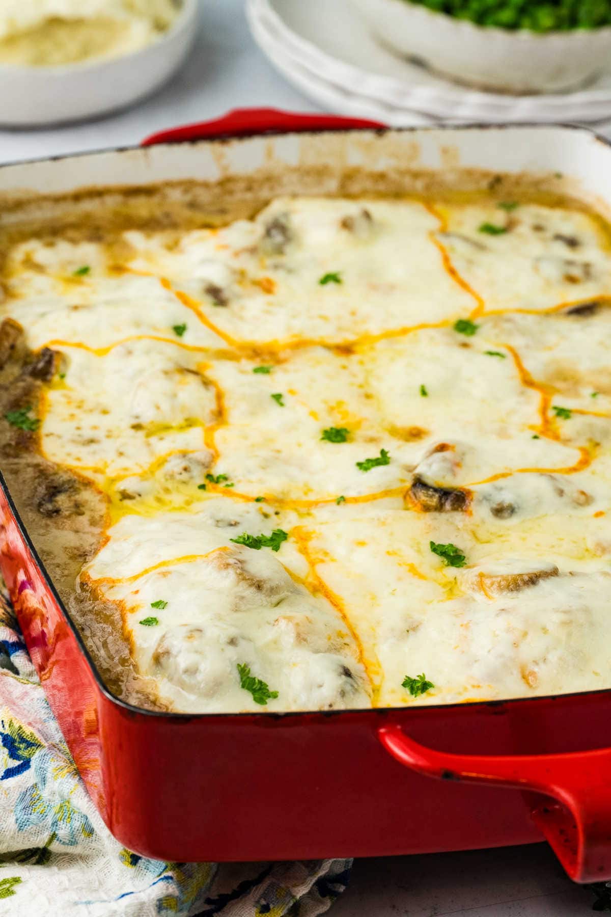 The recipe in a red pan.