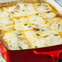 The recipe in a red casserole pan.