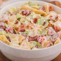The salad in a white bowl.