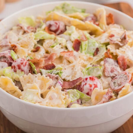 The salad in a white bowl.