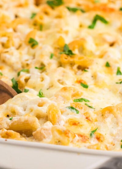 The recipe in a pan with a wooden spoon.