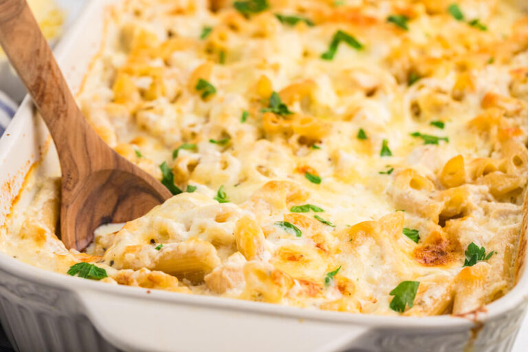 The recipe in a pan with a wooden spoon.