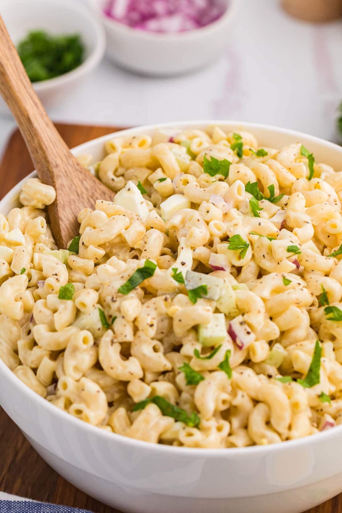 The recipe in a bowl with a wooden spoon.