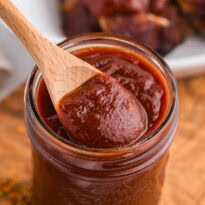 The recipe in a jar with a wooden spoon.