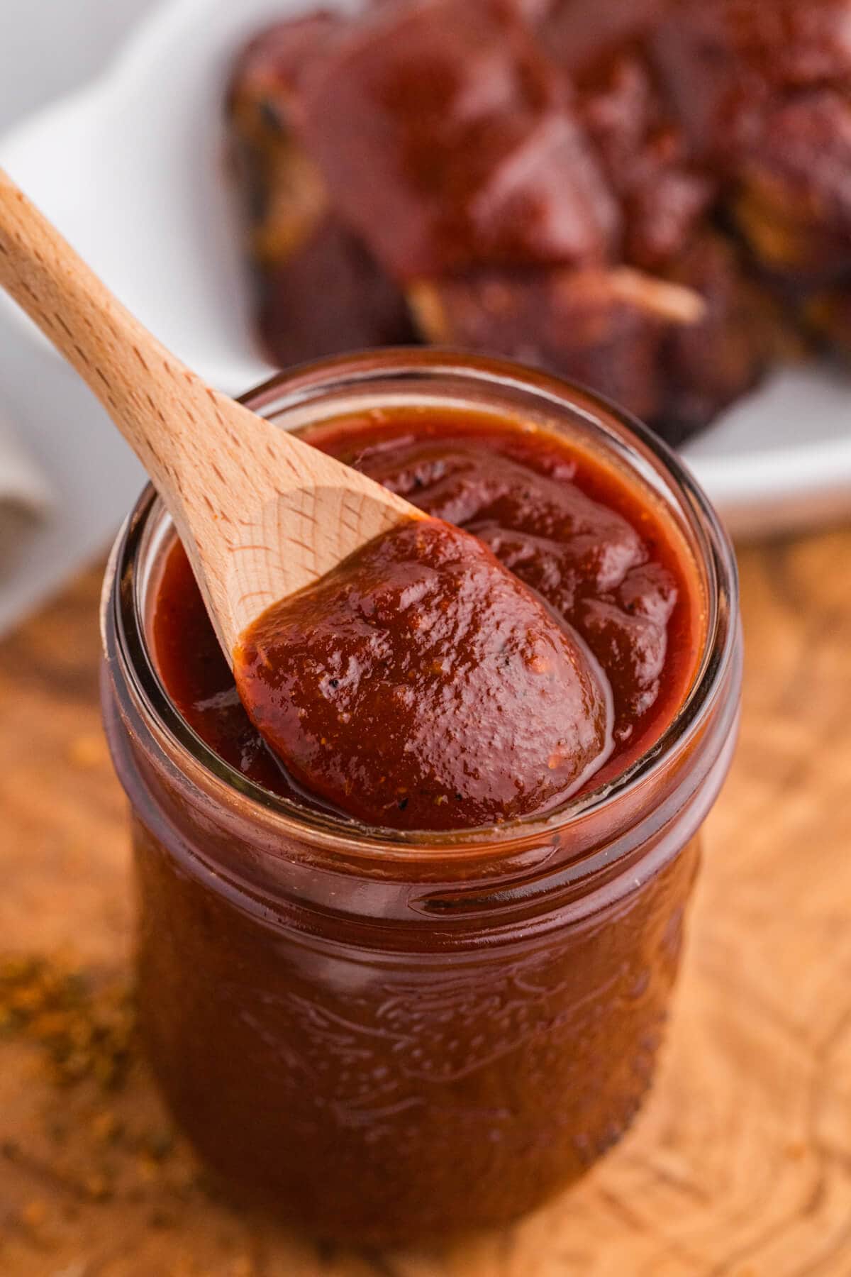 The recipe in a jar with a wooden spoon.