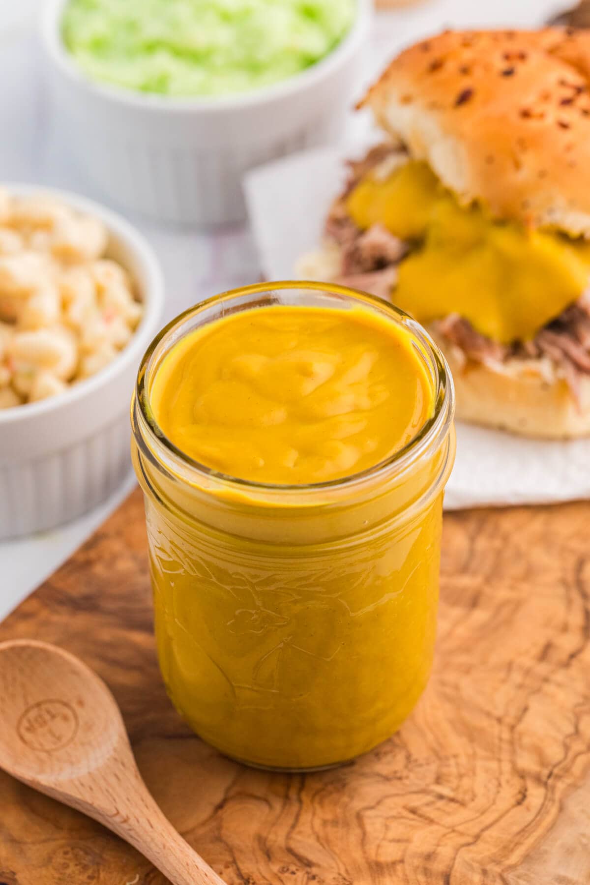 Carolina Mustard BBQ Sauce in a glass jar.