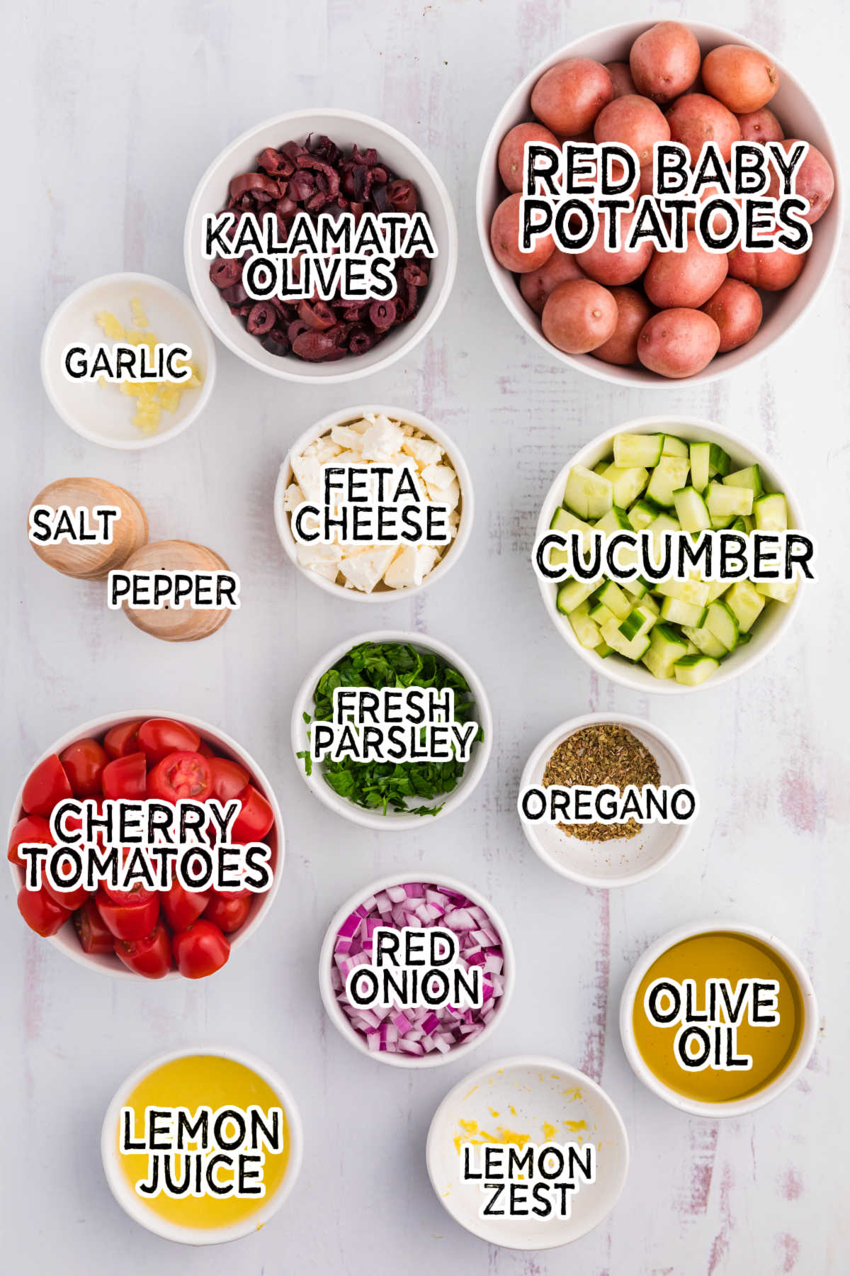 Ingredients on a white wooden surface.