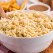 A bowl of the recipe in a wooden spoon.