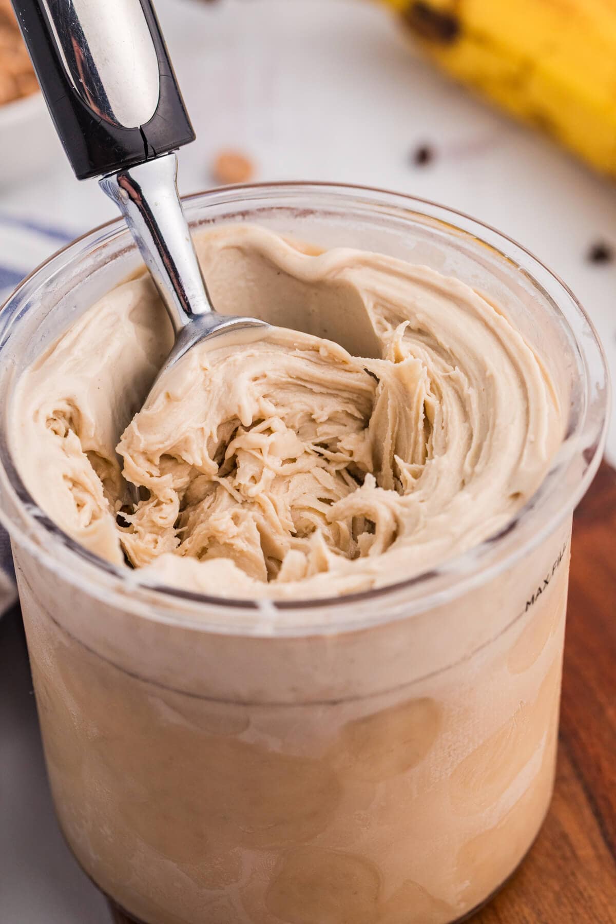The recipe in pint container with an ice cream scoop.