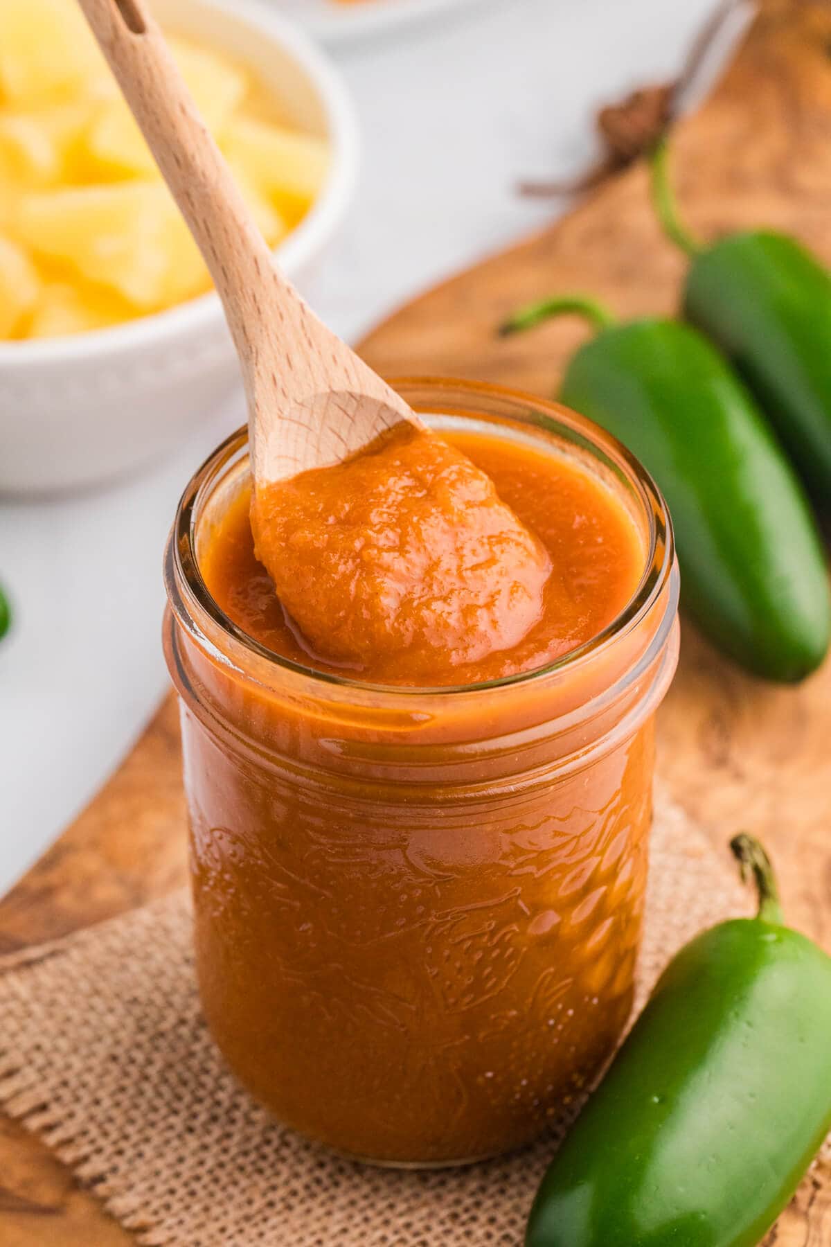 Collage of the recipe in jar with a wooden spoon.