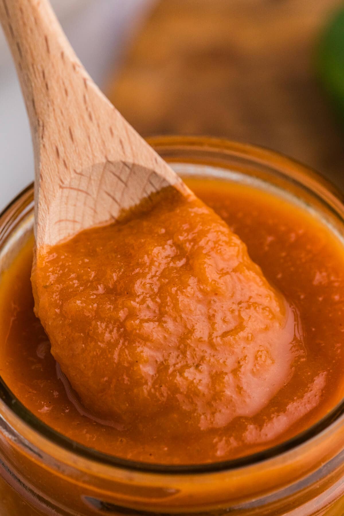 The recipe on a wooden spoon in a jar.