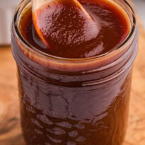 The recipe in a jar with a wooden spoon.