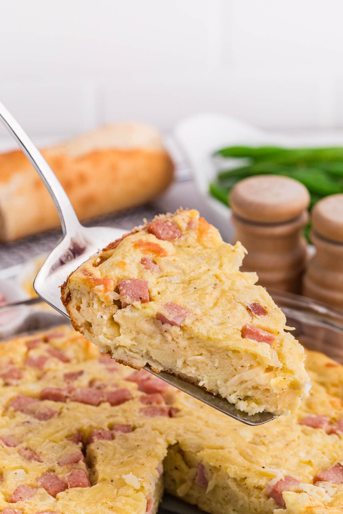 A slice of the recipe on a serving spatula.