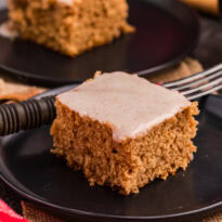 A piece of cake on a plate.