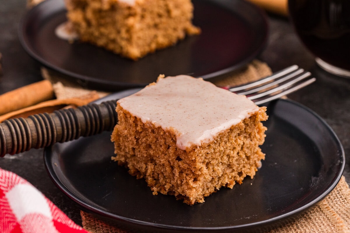 A piece of cake on a plate.