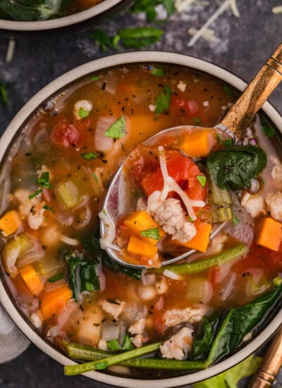 A bowl of the recipe with a spoon in it.