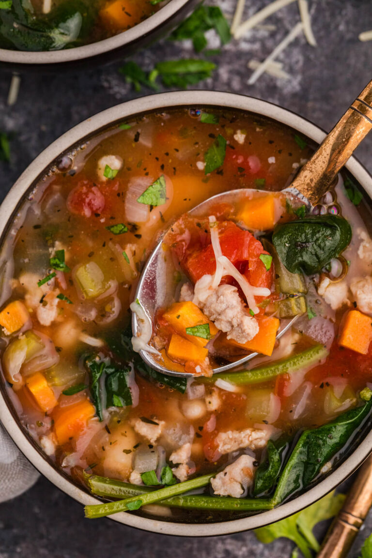 A bowl of the recipe with a spoon in it.