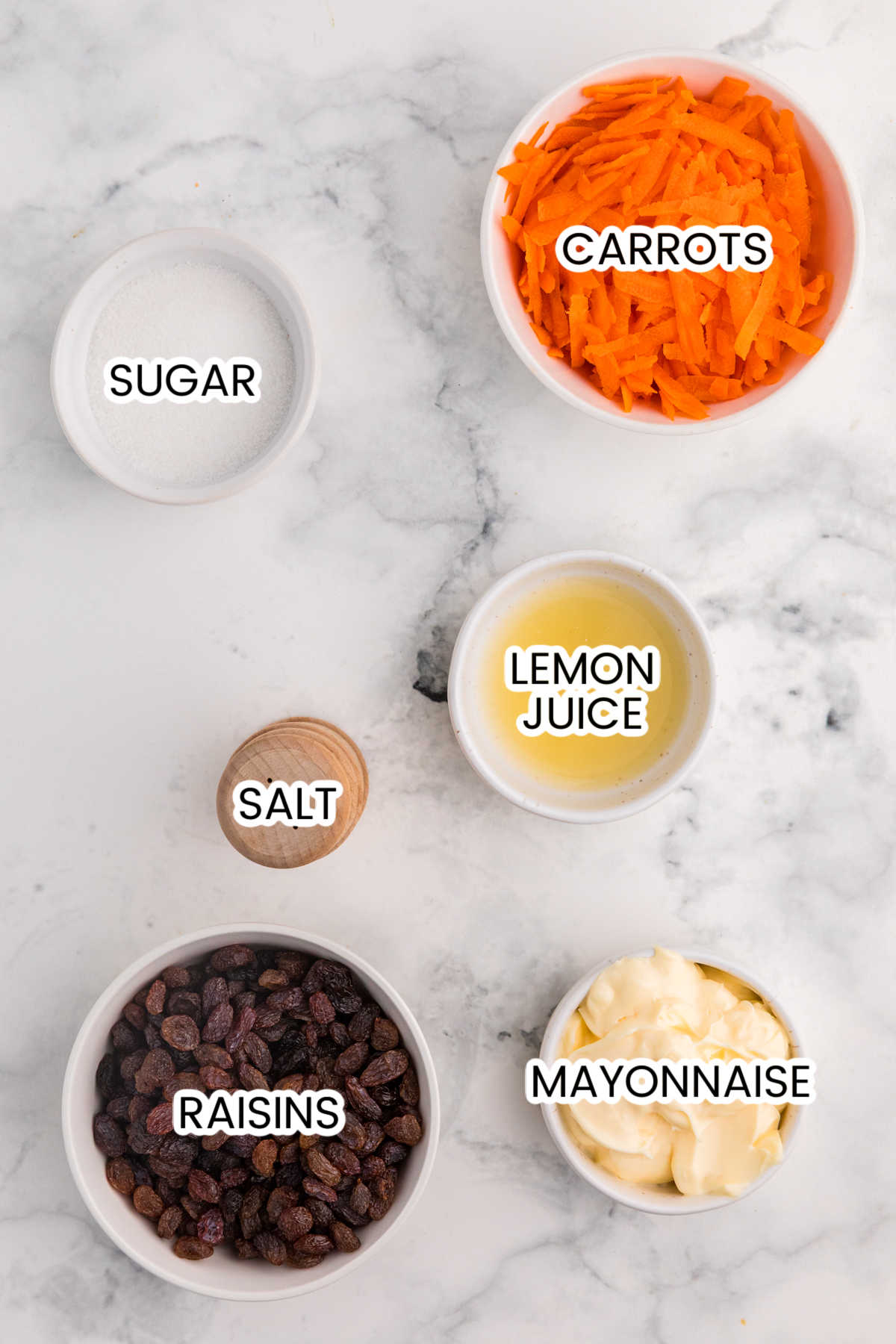 Ingredients on a white marble counter.