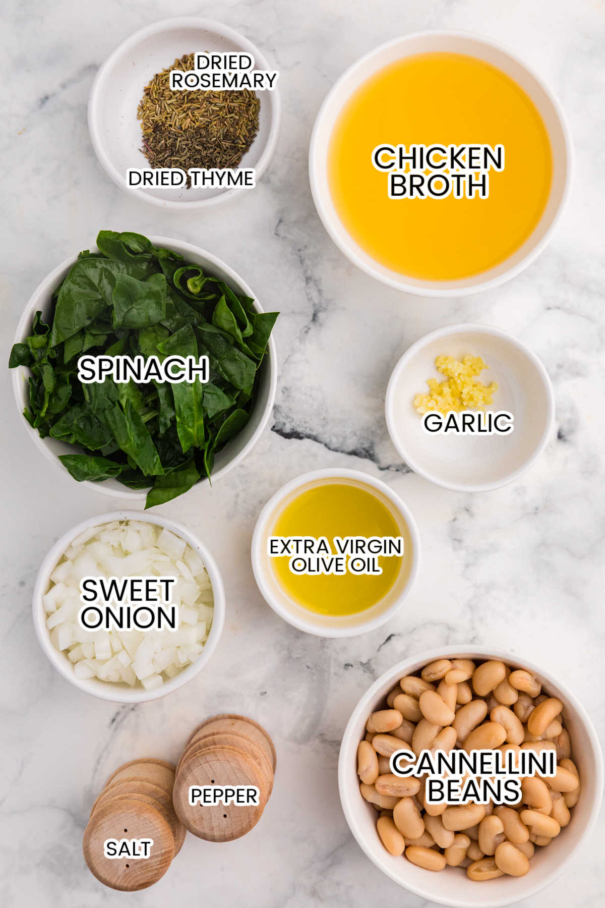 Ingredients on a white marble counter.
