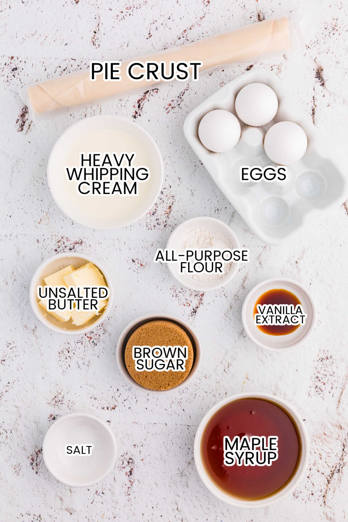 Ingredients for Maple Syrup Pie including pie crust, maple syrup, brown sugar, eggs, heavy whipping cream, butter, flour, vanilla, and salt.